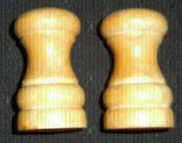 They're made of solid, natural wood and hold a lot of salt and pepper. I also have a Keurig carafe....
