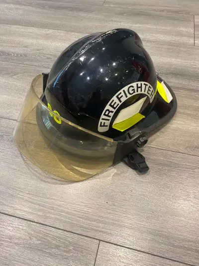 Again, clearing out some family items. This is a real black Safeco fire fighting helmet that saw a l...