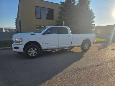 Selling a used 2022 Dodge 3500 crew cab 4x4 long box with a 6.4 hemi powered. Good tires, truck has...
