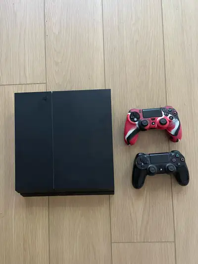 Sony PlayStation 4 with 2 controllers, View more