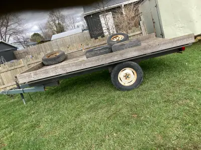 7x12 flat deck trailer. Good condition, ready to use with ownership.