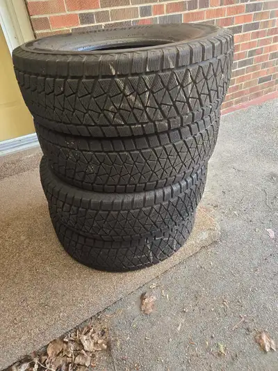 Bridgestone Blizzard Winter tires. 235/75 R15. Like new.