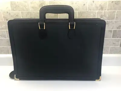Genuine FENDI briefcase. Authenticity code in pic. Very good condition. Includes FENDI draw-string b...