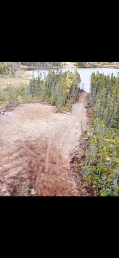 WATER FRONT LAND ON BIRCHY COVE RD, located approximately 2km from highway driving into Howley, the...