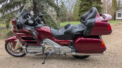 2004 Honda Gold Wing for sale $10,499.00 Single owner, well maintained stored indoors a Candy Black...