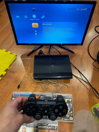 PS3 Super Slim 500Go remote and 9 games, View more