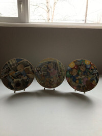 6 Carol Lawson collector plates