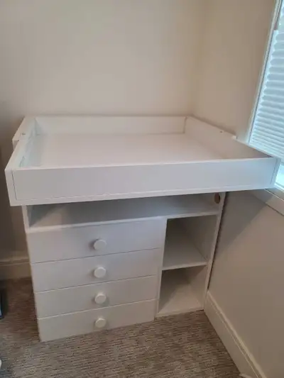 Change table, dresser, and kids desk all-in-one. Barely used with great versatility. Measurements ar...