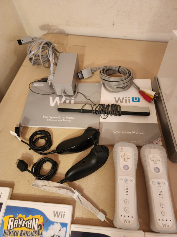 Nintendo Wii with 4 Controllers and 7 Games and Manual in Nintendo Wii in Edmonton - Image 2