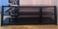 Moving sell- black tinted glass TV stand table
