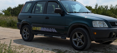 Acura RSX rims with tires sized perfectly for a 1st Gen honda CRV. Will probably fit 2nd Gen CRV als...