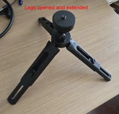 Mini tripod with extendable legs., View more