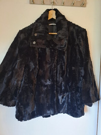 Short black faux fur jacket.  SIze M, fits larger