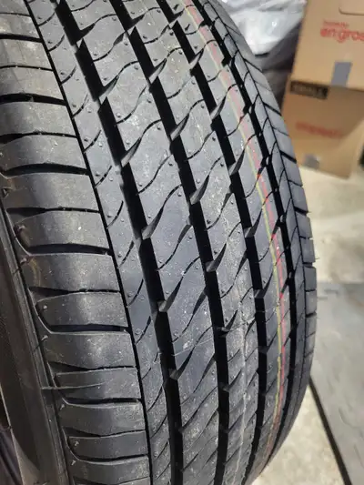 Never used Firestone tire Toyota factory rims set of 4 205/55R16 Fits most Corollas and different ye...