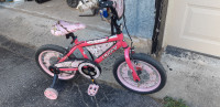 Like New. Girl's single speed bicycle with training wheels