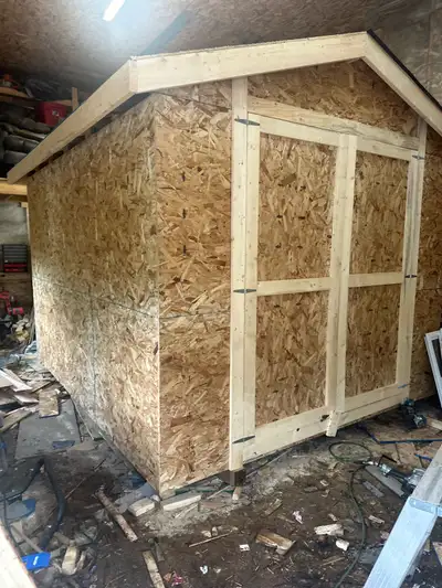 10 by 12 shed 2-3 foot doors, 4/6 treated skids osb 2/6 floor 16 inch centers Factory trusses Shingl...