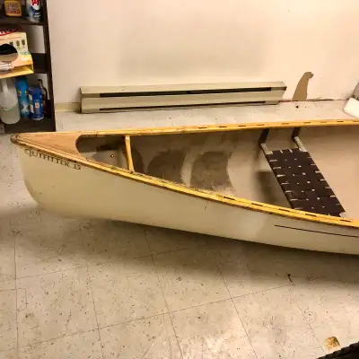 Fibreglass Swift Outfitter 15 with skid plates (also sold as the Algonquin 15). New gunwale section...