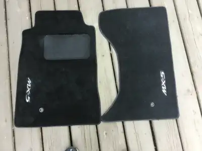 Mazda Miata floor mats .Black; from a 2008 model but will fit most years