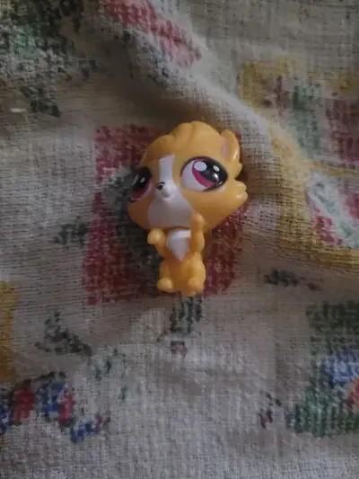 good shape and good condition Kitten #047 from Hasbro, featuring an orange body with white markings...