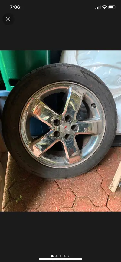 Selling a set of used Pontiac chrome rims and tires. These rims are 17 inches and come with Ecosport...