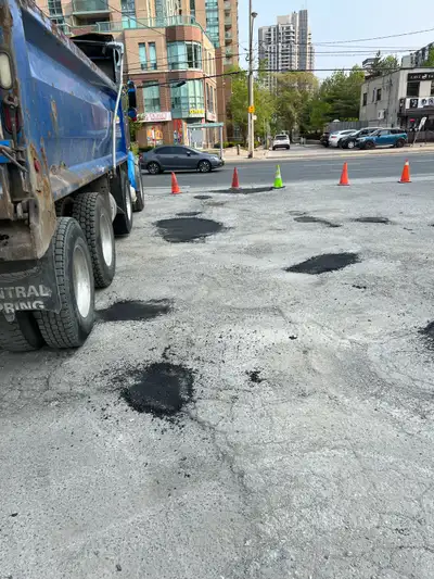 Parking lot pothole repair, View more