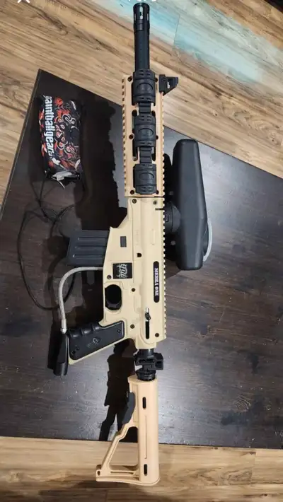 Tan Tippmann Sierra one paintball marker, View more