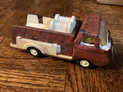 Vintage Tonka. See photos. Gorgeous patina. Played with galore. Nice antique collectible. Displays w...