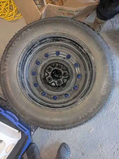 Uniroyal Tiger Paws Winter Tires on rims. Used on a 2012 Nissan Altima- see bolt pattern in photo. 2...
