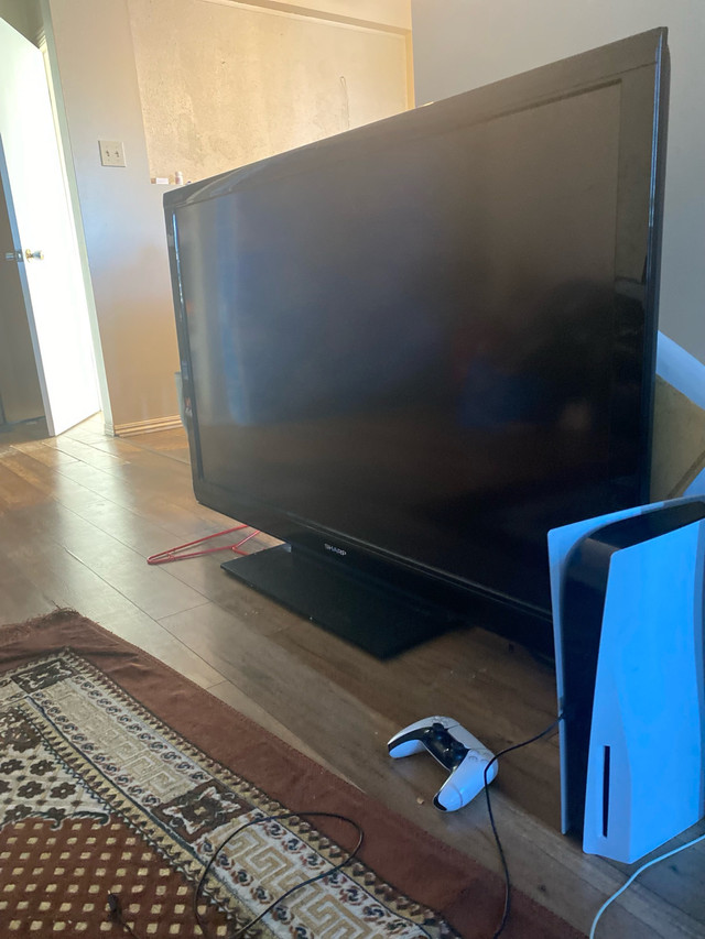 Selling 65 inch tv  in TVs in Red Deer