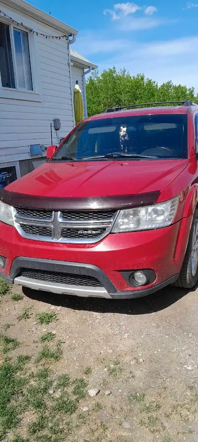 Selling my 2012 dodge journey 3.6 rt awd good family vehicle it comes fully loaded with subwoof tint...