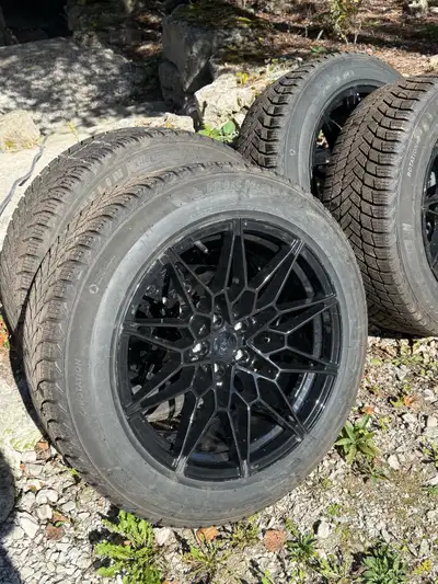 I am selling a set of four pre-owned Michelin X-Ice Snow SUV winter tires in size 235/55R19, profess...