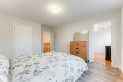 Furnished bright private room with in suite bathroom in the second floor of a family home. 5 mins dr...