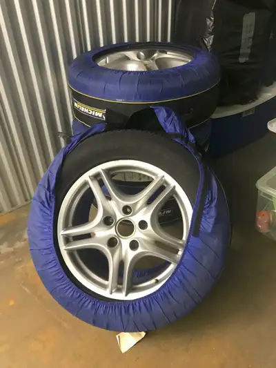 4 Rims, Tires are outdated, covers not included
