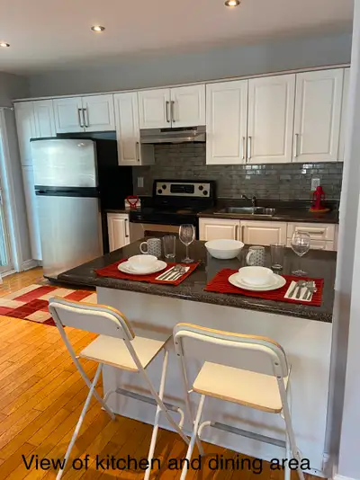 $2,580 2-Bedroom Main Floor Furnished w/ Utilities Mid-Town.