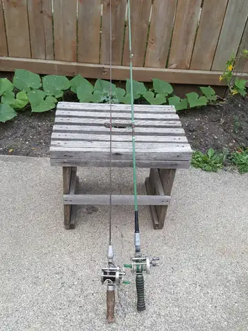 2 Pfleuger reels, Trusty + Akron, both with braided line + working well. 2 rods, one fiberglass + on...