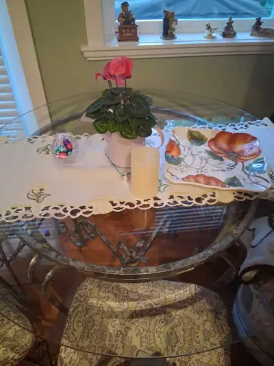 Lovely glass kitchen table and four chairs!, View more