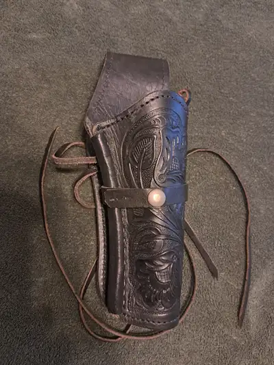 Old west holster for Colt 45 or similar pistols. $70.00 O.B.O. No belt. Ph.519-575-8503