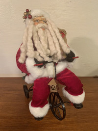 Santa Claus on tricycle Christmas decoration
