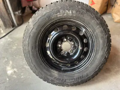 Set of 4 Hankook Snow Tires. 5 Bolt with steel rims 225/70/R16 Very little use; 9 mm of tread remain...