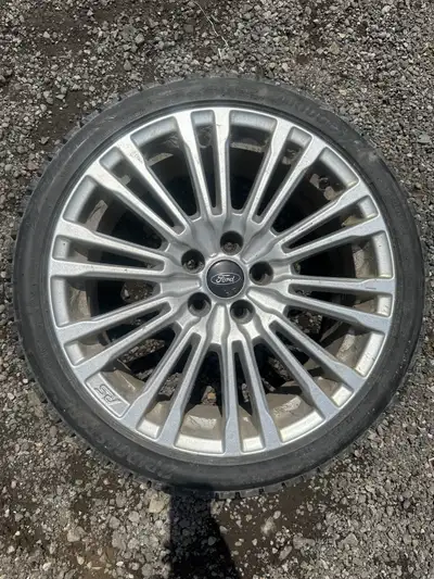 Ford Focus RS rims and tires. Size 225/40/18. Came off a 2017 focus RS. This is the winter set. This...