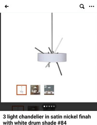 This stunning 3 light chandelier in satin nickel finah with..