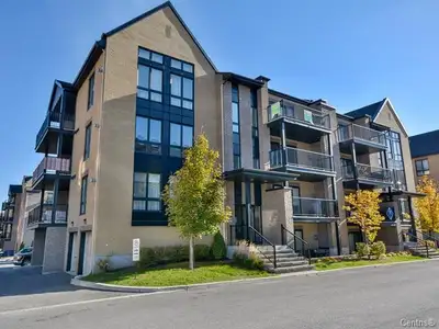 SUPERBE CONDO 2 CHAMBRES PLUS GARAGE