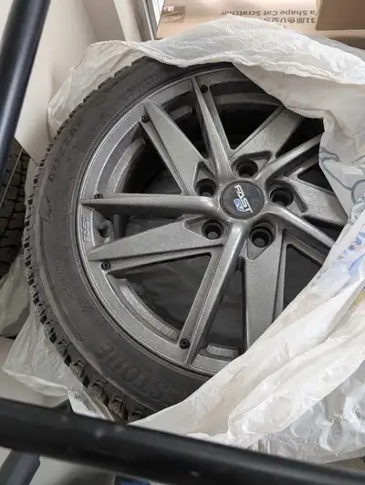 Selling a premium winter wheel and tire package in excellent condition. This set was purchased brand...