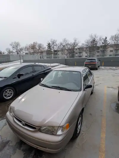 Low mileage, well maintained car. Runs and drives great. Clean inside and out. Comes with summer tir...