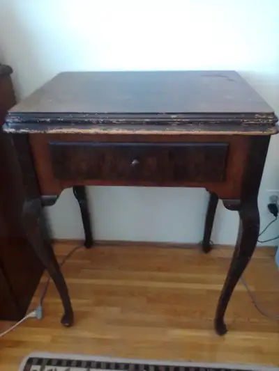 Antique White 1941 Sewing Machine, View more