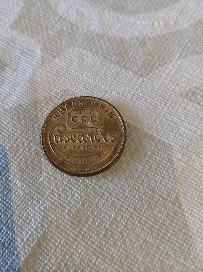 Cascaret Advertising Coin. This one has the same image on both sides, with the only difference being...