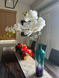 Teal vase with Orchid flowers 