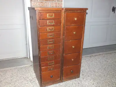 Beautiful vintage apothecary style chest cabinet with 16 drawers; Warm patina aged wood grain; 10 sm...