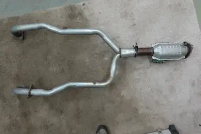 USED ON AN 88 CORVETTE Front Y pipe pre cat delete, with main Cat installed! Y pipe PRE CAT DELETE w...