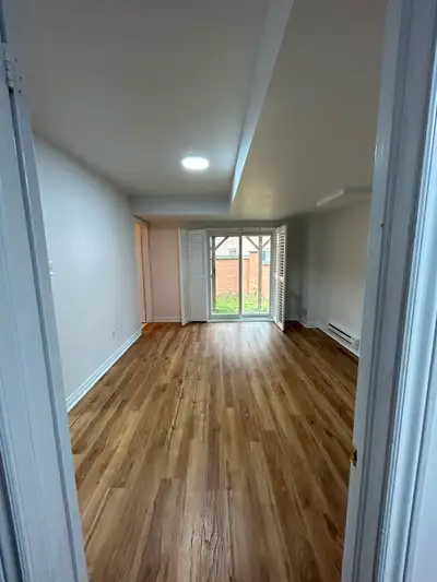 Spacious basement for rent for one person, featuring a cozy bedroom, in suite bathroom, shared kitch...